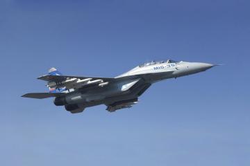 开云下载-足球与记忆的共鸣，当毕尔巴鄂的绿茵响起安哥拉的回响